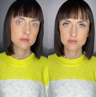 A woman with a short bob haircut wearing a green sweater, showcasing her clear complexion and well-defined lashes.